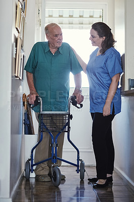 Buy stock photo Senior man, walker and support with nurse for physiotherapy, healthcare or trust at old age home. Woman, medical caregiver or volunteer helping or talking to person with a disability in retirement