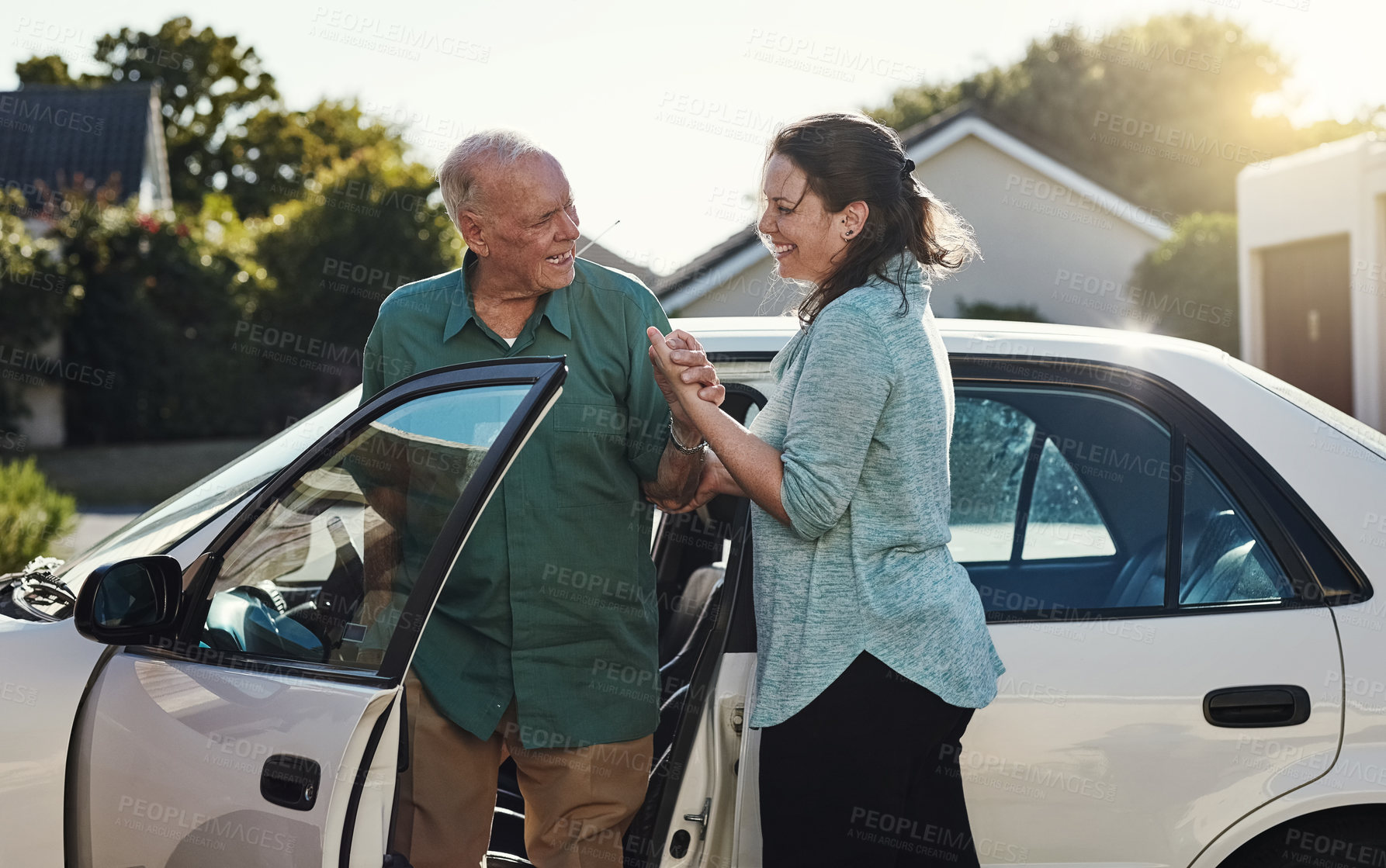 Buy stock photo Car, help and caregiver with senior man for assisted living, retirement care and rehabilitation. Travel, transportation and happy woman helping elderly male person from motor vehicle for service