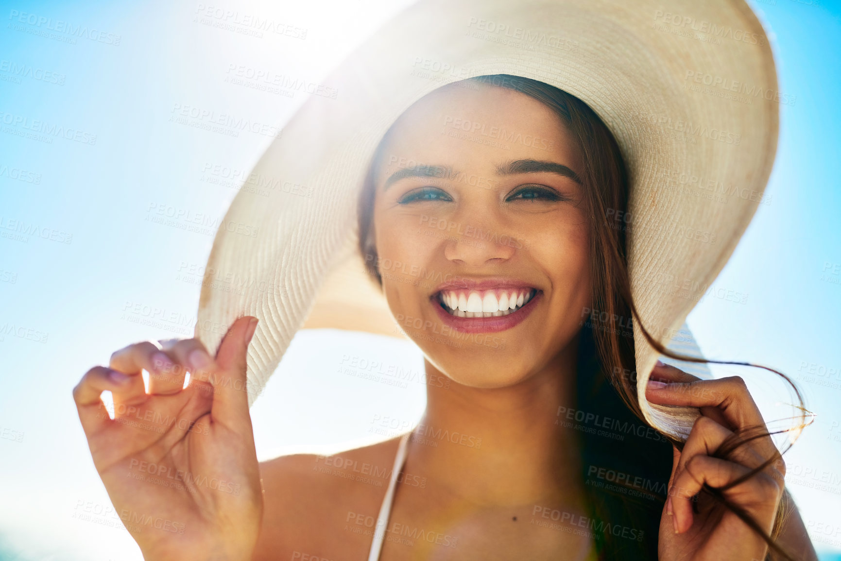 Buy stock photo Closeup shot of a beautiful young woman spending some time at the beach