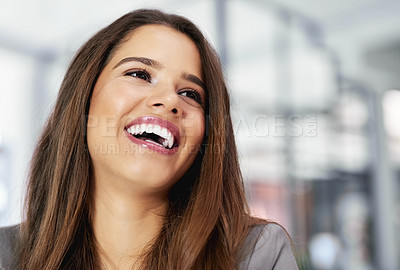 Buy stock photo Shot of a confident young businesswoman in an office