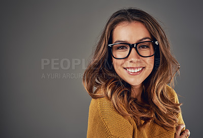 Buy stock photo Glasses, happy and portrait of woman in studio with confidence, pride and smile on gray background. Optometry, frames and face of person with prescription lens for vision, eyesight and wellness