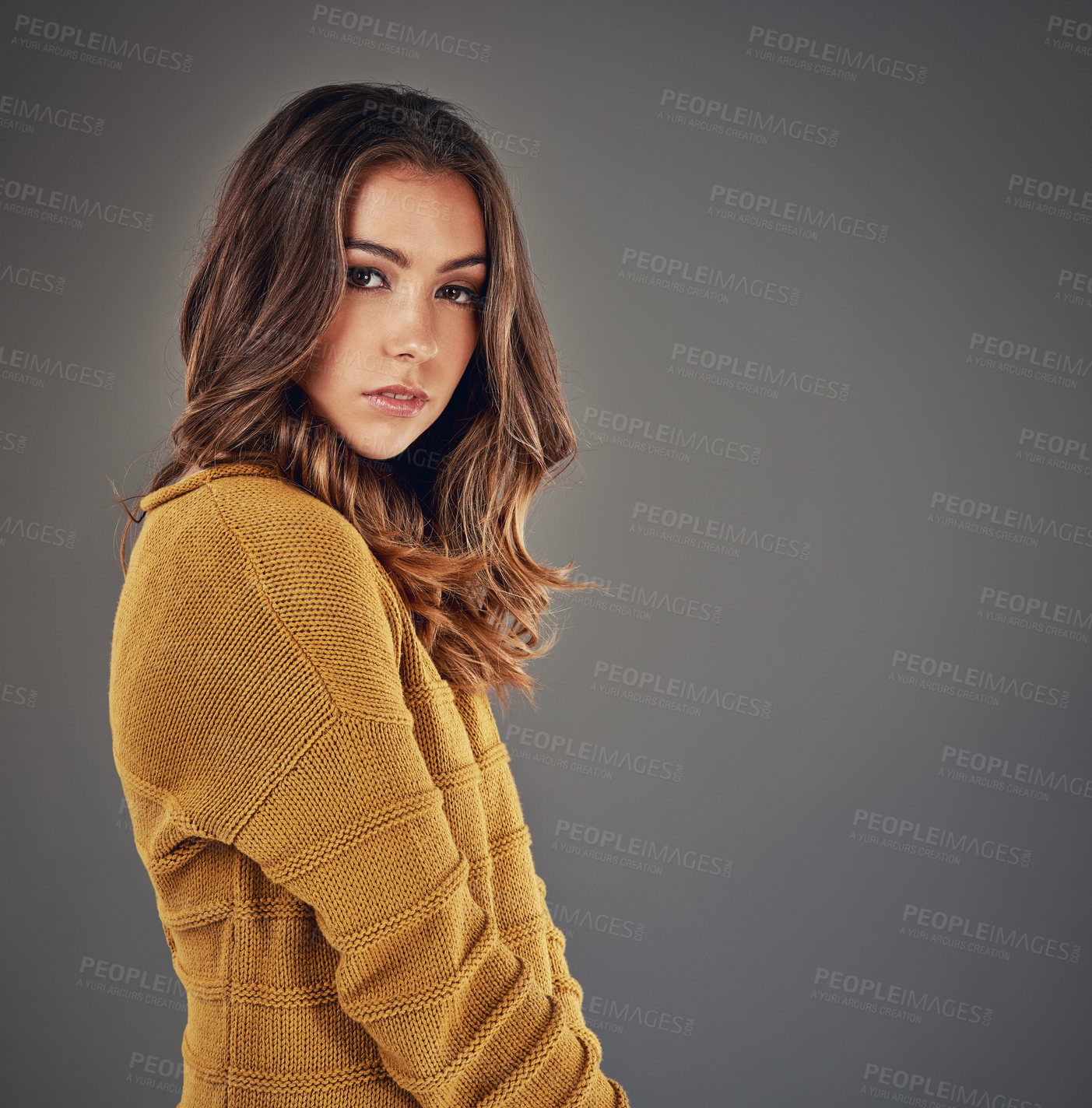 Buy stock photo Portrait, confident and woman as student in studio with yellow jersey, knowledge and learning for education of future.  Girl, pride and trendy fashion for university, study and grey background