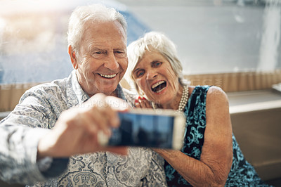 Buy stock photo Shot of a mature couple spending the day together