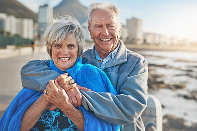 Buy stock photo Portrait, seaside and hug with senior couple, smile and excited with adventure, travel and journey. Face, old man and mature woman with embrace, beach and getaway trip for anniversary and vacation