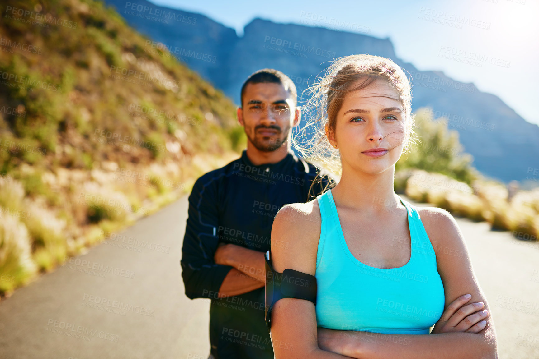 Buy stock photo Running, crossed arms and portrait of couple on road for workout, exercise and marathon training outdoors. Sports, dating and man and woman for cardio for health, fitness and wellness in morning