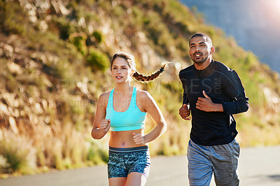 Buy stock photo Running, man and woman on road in nature for fitness, support and morning marathon training together. Race, runner and personal trainer on path for outdoor workout challenge with body care commitment