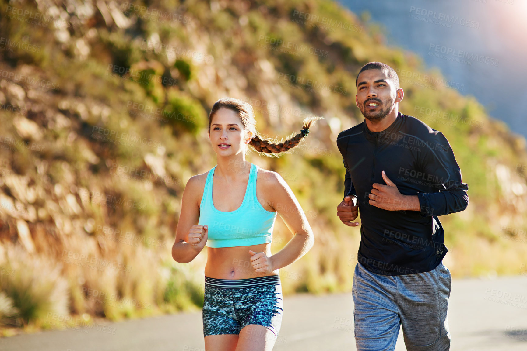 Buy stock photo Running, man and woman on road in nature for fitness, support and morning marathon training together. Race, runner and personal trainer on path for outdoor workout challenge with body care commitment