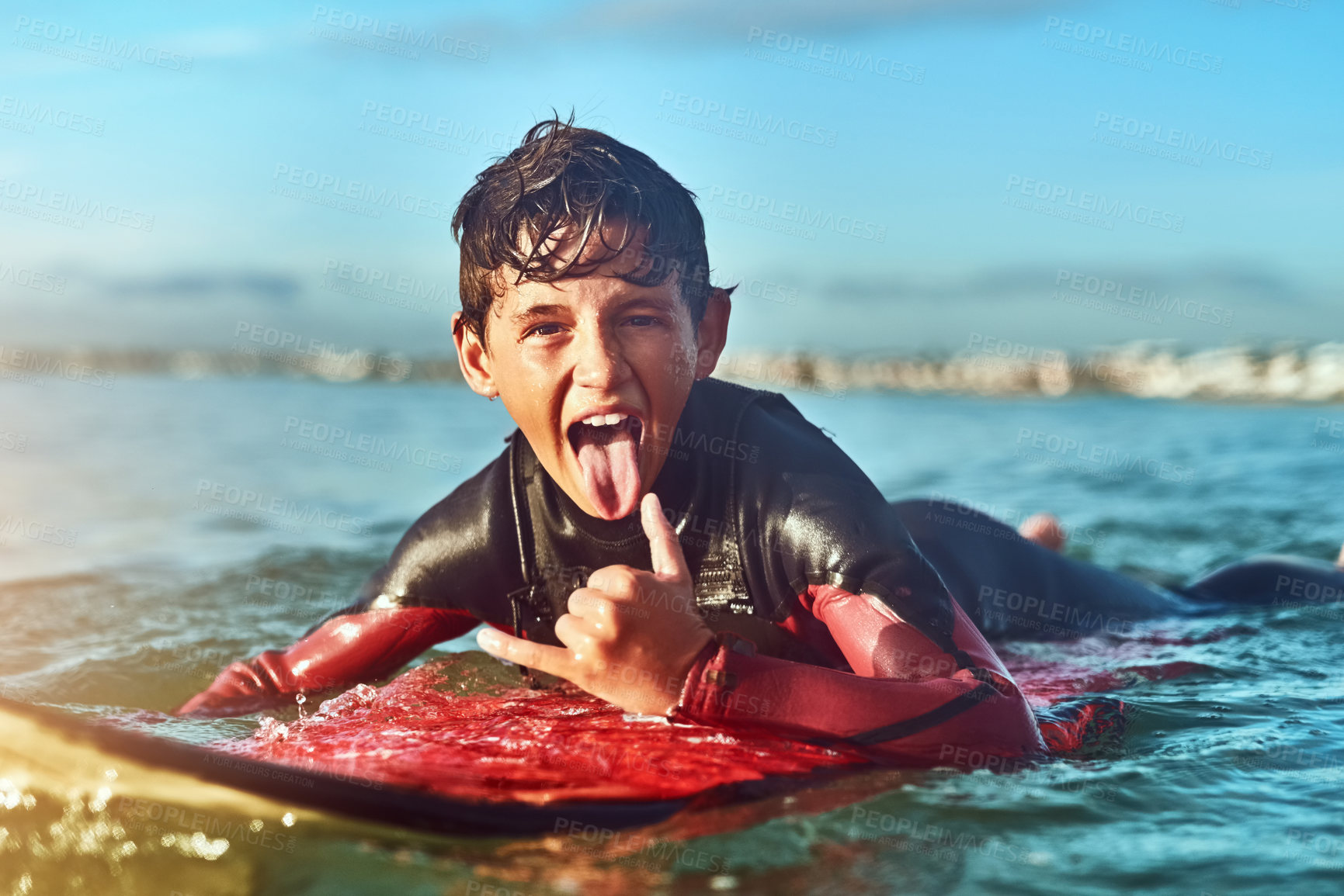 Buy stock photo Portrait, boy or excited surfer at sea for fitness training, workout or sports exercise in water. Shaka sign, athlete or male teenager ready to start surfing on outdoor holiday, vacation in Australia