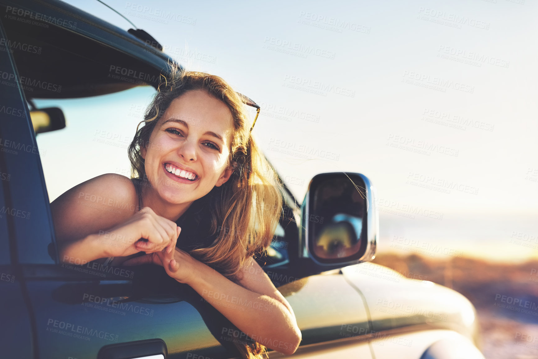 Buy stock photo Cropped portrait of an attractive young woman on a roadtrip