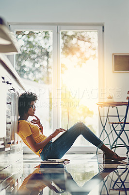 Buy stock photo Relax, laptop and search with black woman on floor for focus, remote work and study. Technology, website and networking with female freelancer thinking at home for blog, email and social media