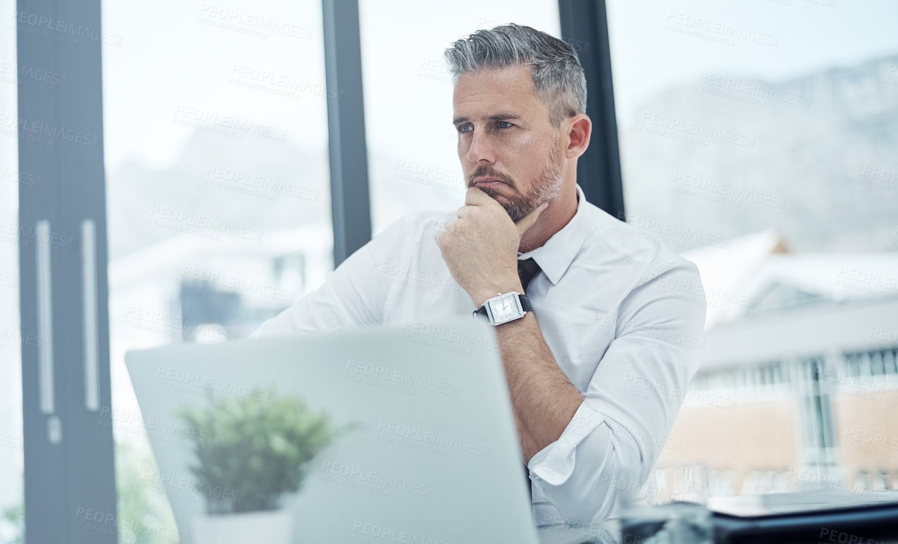 Buy stock photo Thinking, laptop and businessman in office for decision, investment strategy and financial solution. Corporate, accountant and person on computer for budget report, finance review or online research