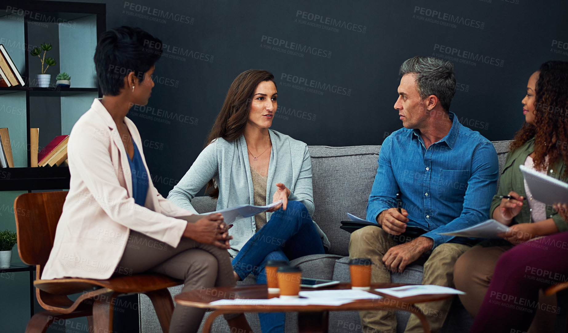 Buy stock photo Shot of a creative team meeting in the office