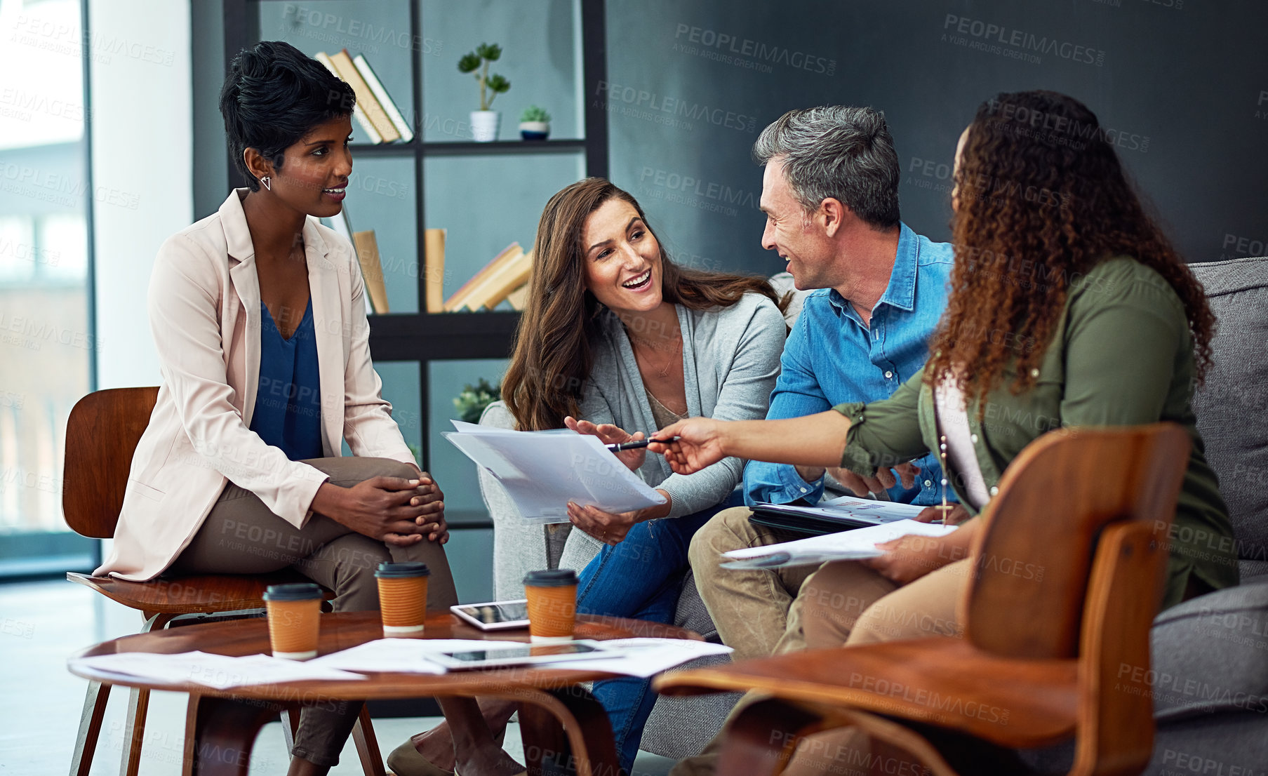 Buy stock photo Shot of a creative team meeting in the office