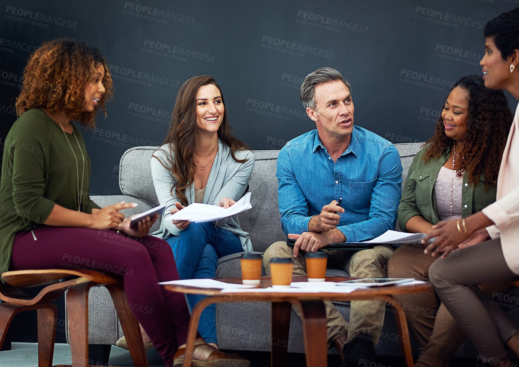 Buy stock photo Shot of a creative team meeting in the office