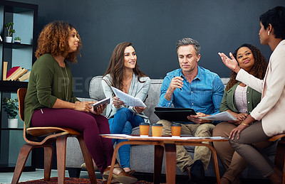 Buy stock photo Shot of a creative team meeting in the office