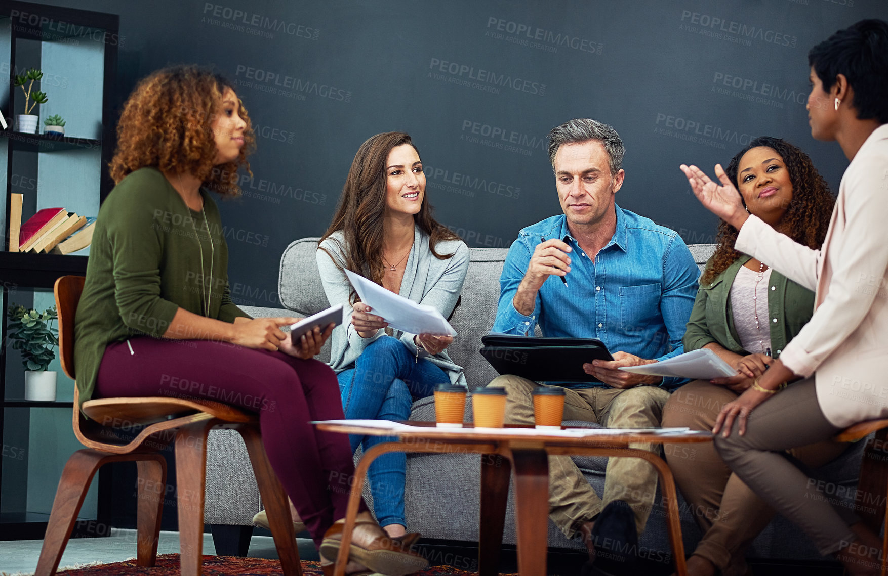 Buy stock photo Shot of a creative team meeting in the office