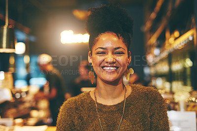Buy stock photo Portrait of a happy young woman standing in a coffee shop