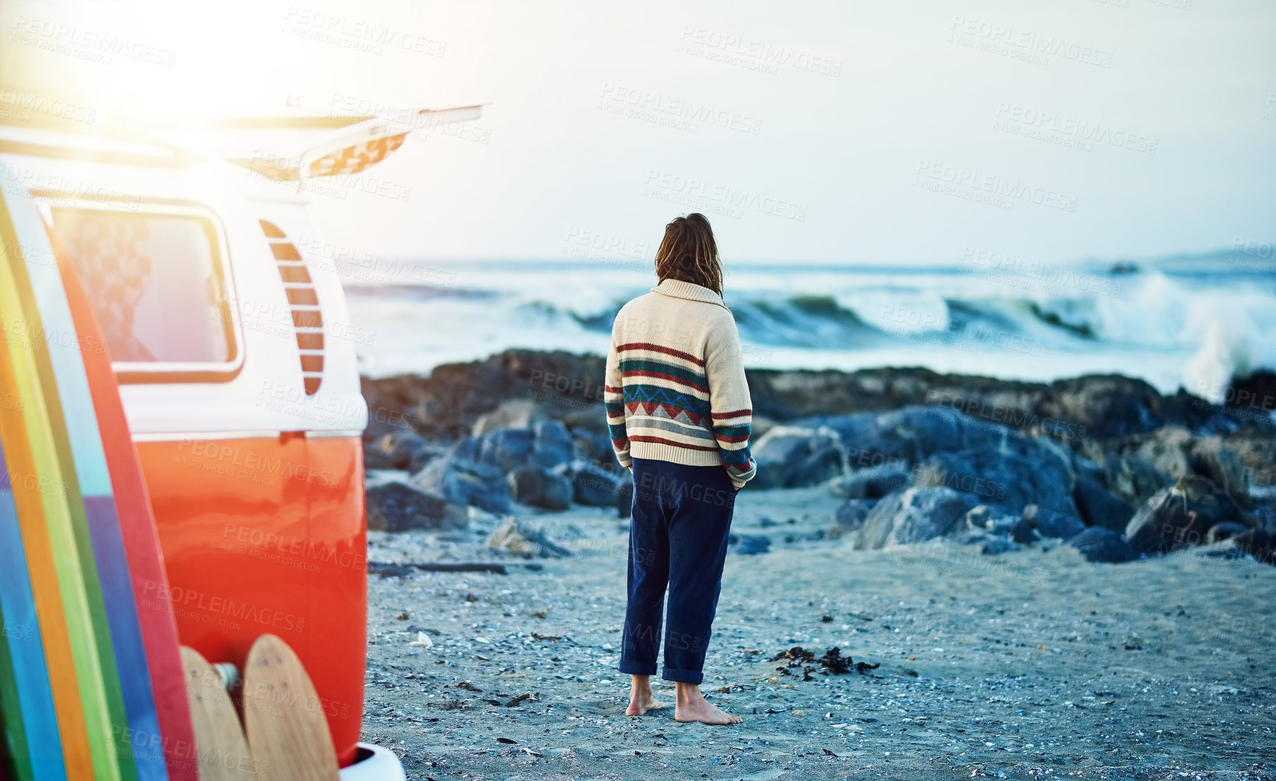 Buy stock photo Rearview shot of a young man stopping at the beach during a roadtrip