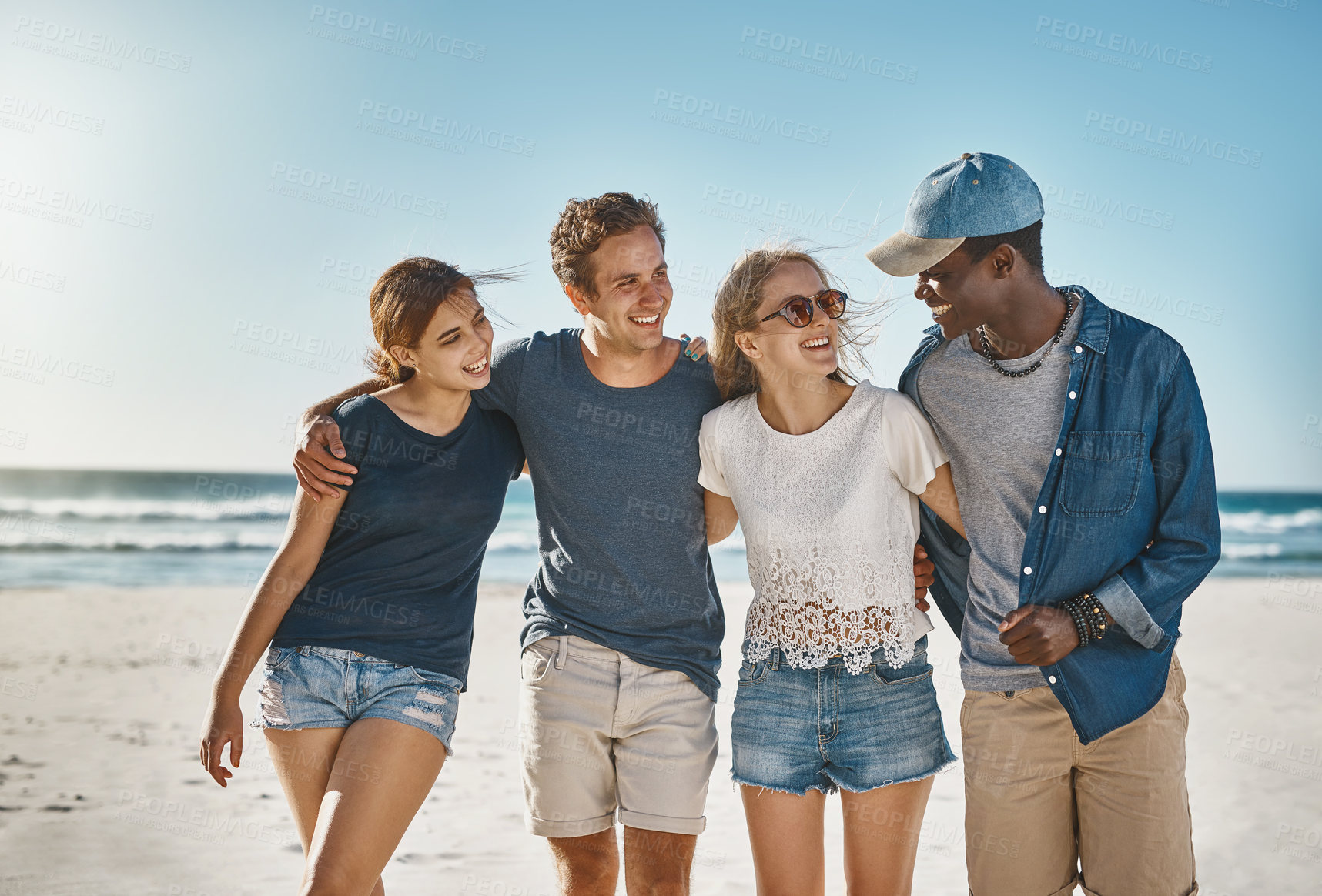 Buy stock photo Smiling, friends and hug on beach in summer for vacation, holiday and bonding or recreation. Happy, men and women embrace seaside for sunset, reunion and adventure or in bali together for weekend