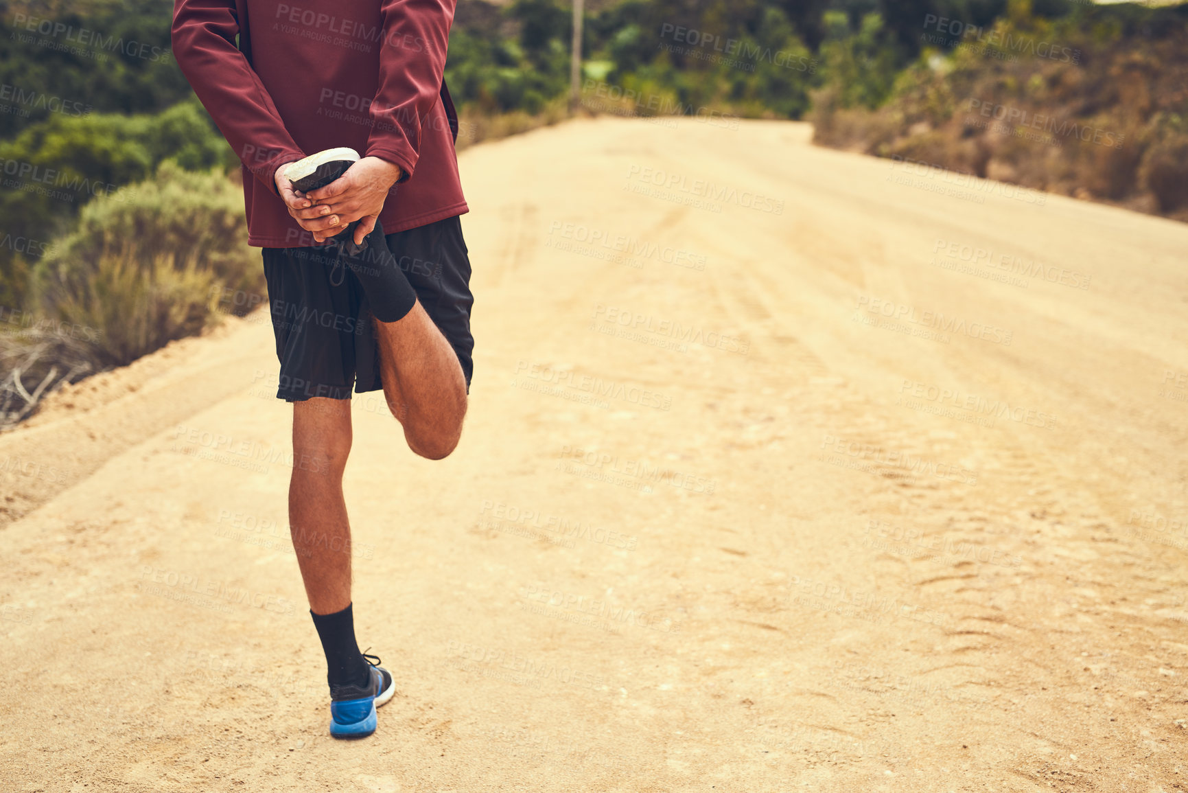 Buy stock photo Stretching, legs and man in nature trail for training, exercise and fitness workout for wellness. Back, male runner and warm up with balance for challenge, marathon and jog as cardio outdoor