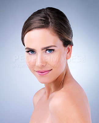 Buy stock photo Woman, portrait and happy for skincare for routine in studio on blue background and satisfied with results. Natural, beauty and smile with confidence for transformation, facial and skin treatment