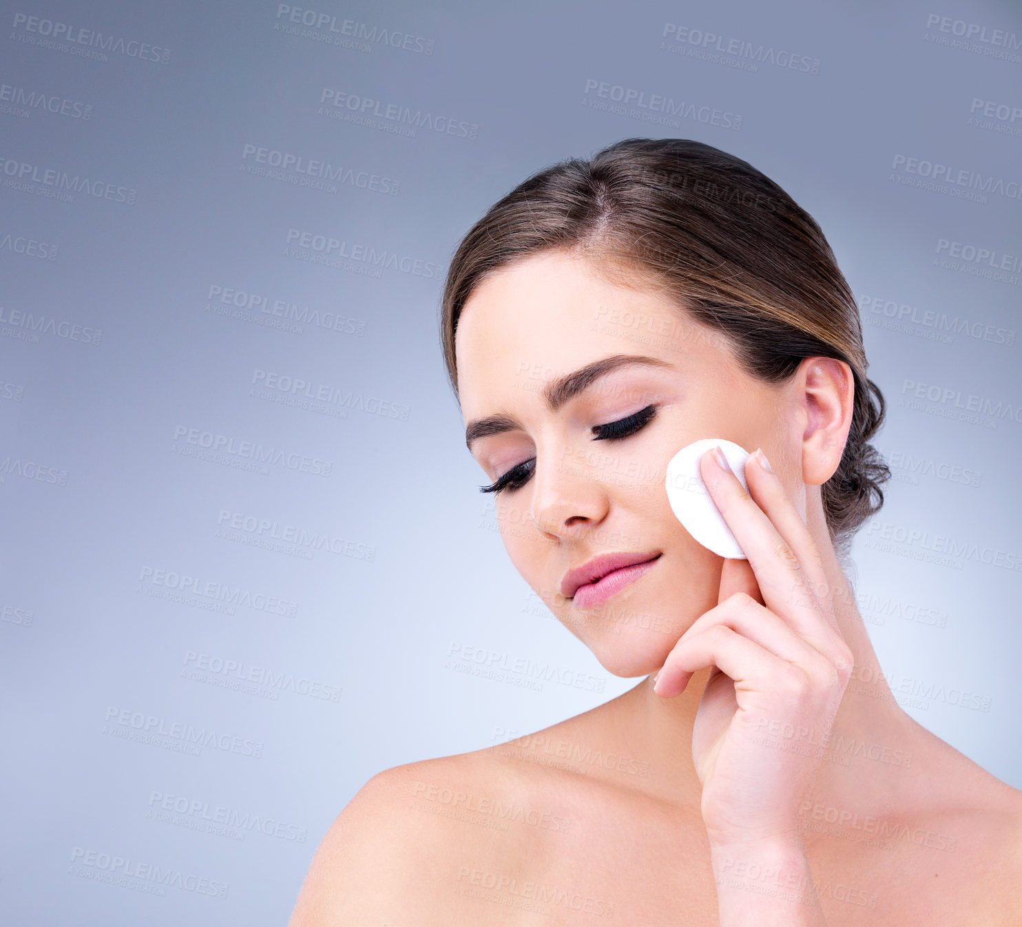 Buy stock photo Woman, studio and skin care with cotton pad, beauty routine and dermatology health by backdrop. Model, skin wellness and cosmetic clean for glow, facial or natural exfoliate by grey studio background
