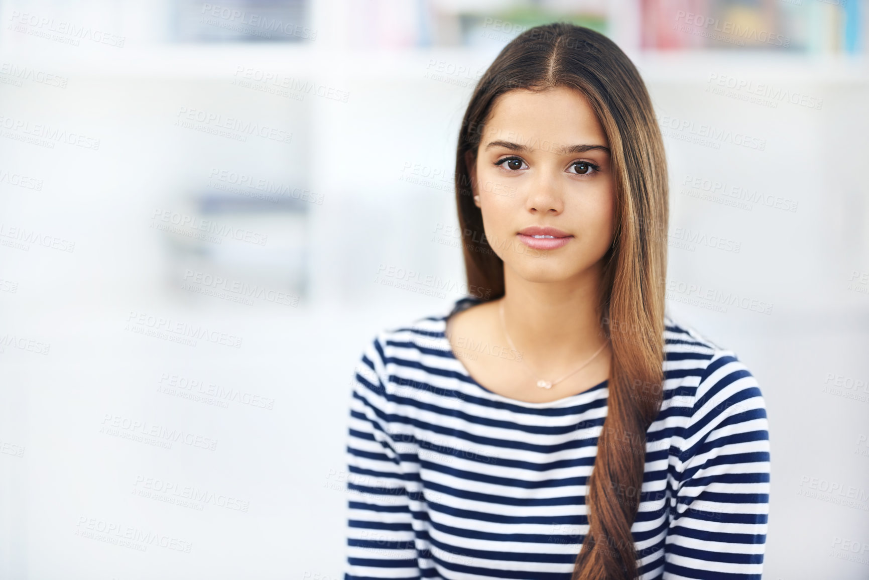 Buy stock photo Portrait of an attractive young woman relaxing at home