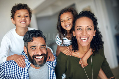 Buy stock photo Portrait of a happy family bonding together at home