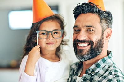 Buy stock photo Father, child and portrait with birthday hats for celebration with eyeglasses, happy and props for decoration in home. Family, girl and dad at party event with smile for bonding and social gathering