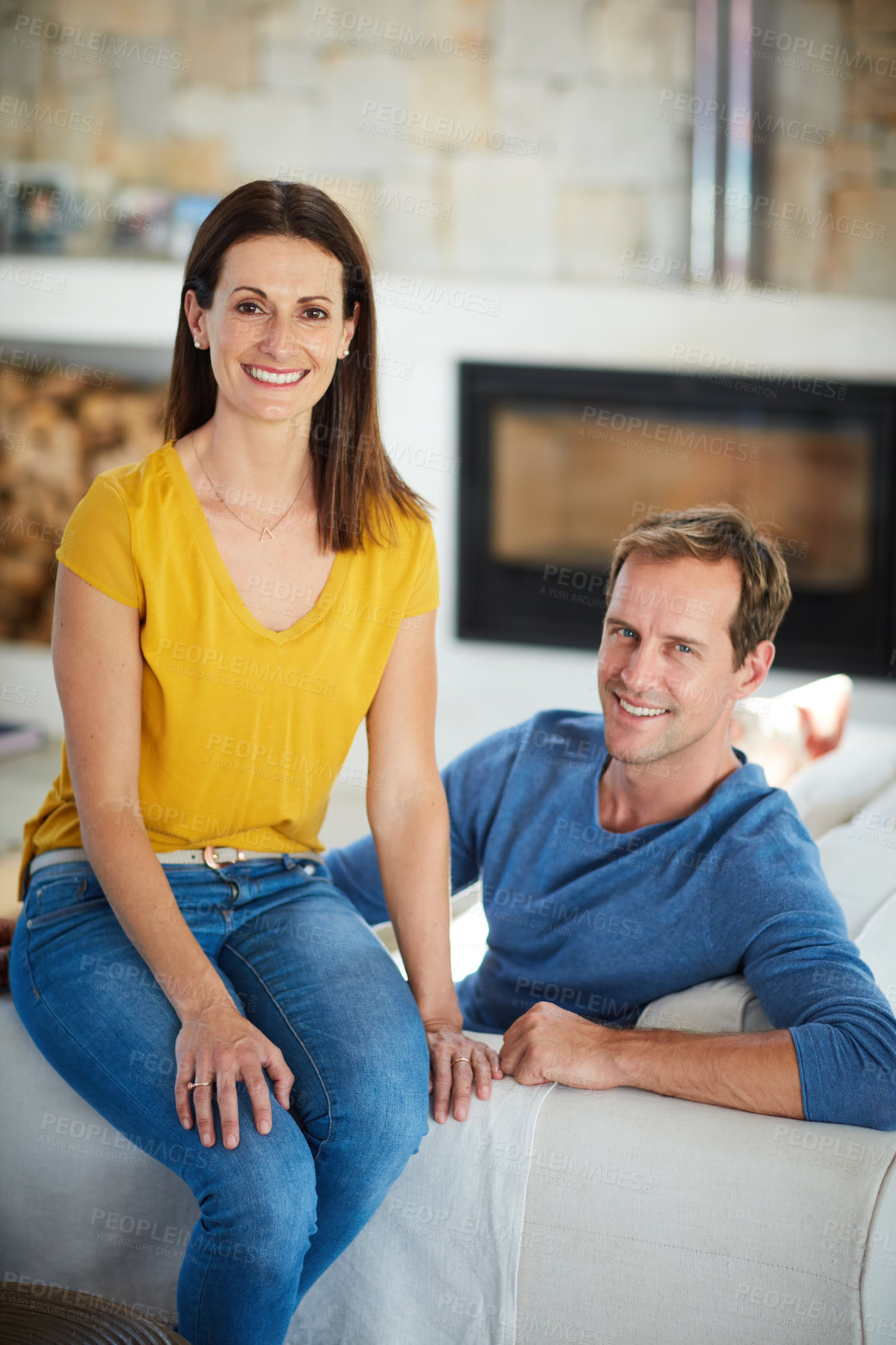 Buy stock photo Portrait of a mature couple relaxing together at home