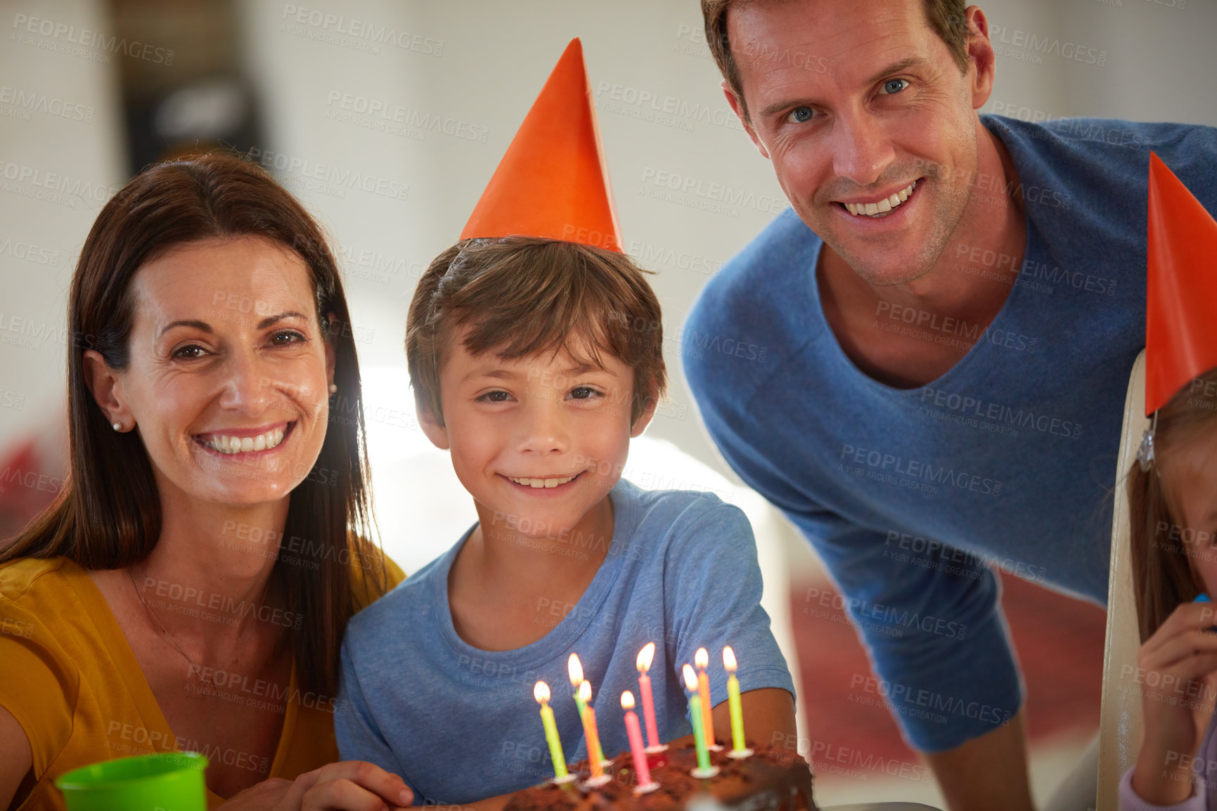 Buy stock photo Portrait of a happy family having a birthday party at home