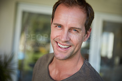 Buy stock photo Cropped shot of a man spending the day at home