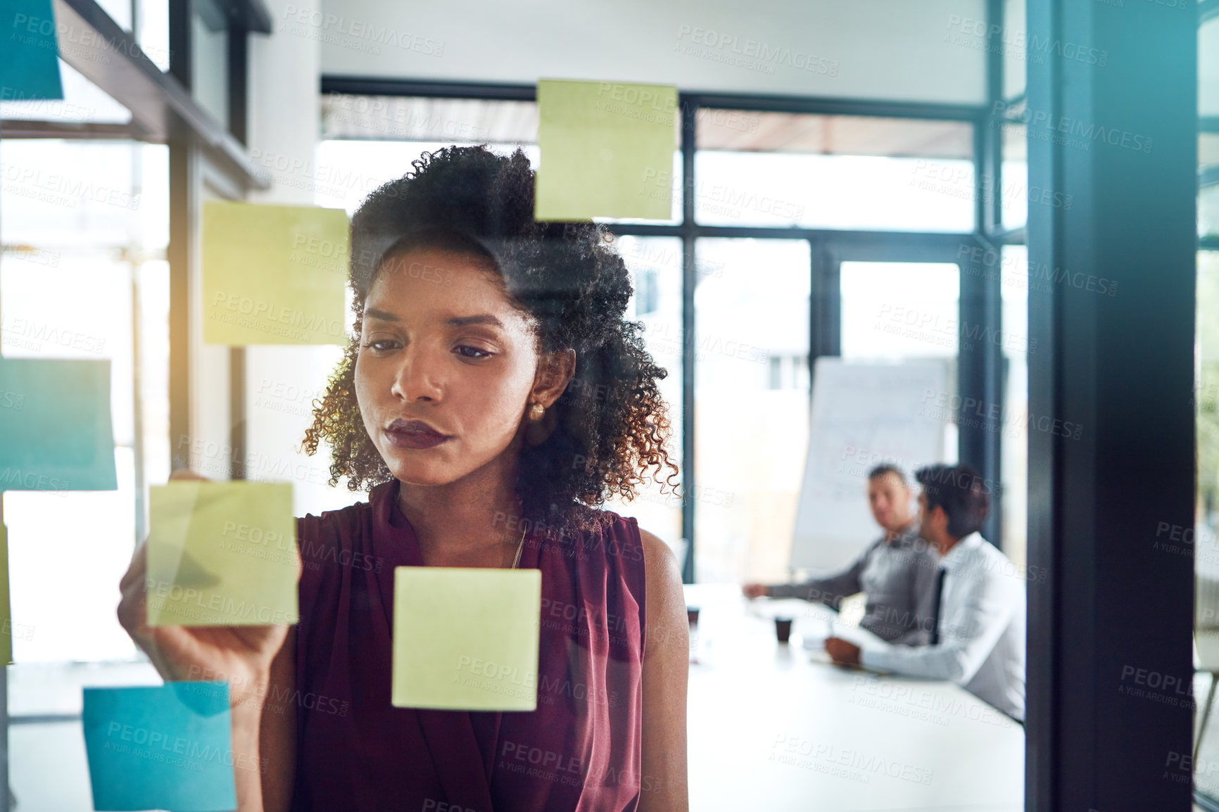 Buy stock photo Thinking, strategy or black woman for business schedule planning, creative idea or marketing review in meeting. Corporate, glass post it sticky note or manager for analytics or project management

