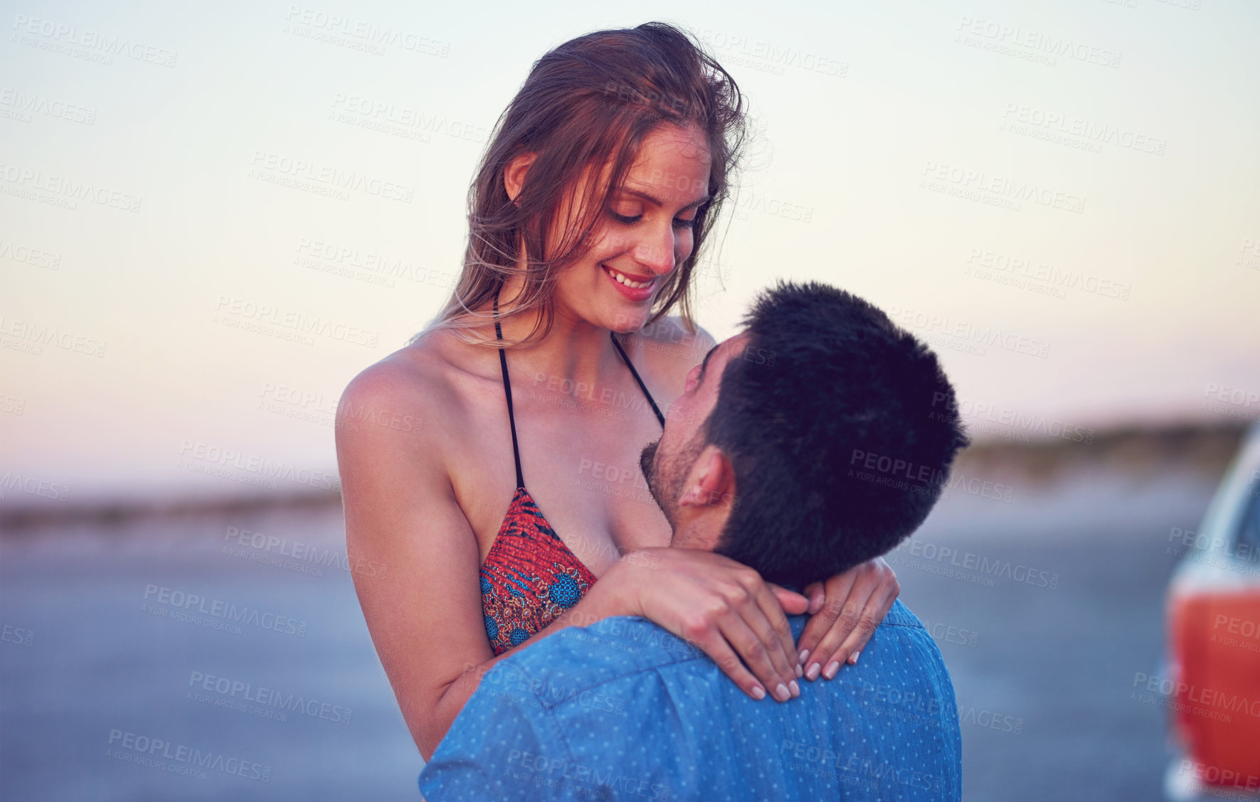 Buy stock photo Couple, love and happy at the beach on date, vacation or road trip in summer at sunset, together and romantic adventure. People, hug and support in relationship, happiness or boyfriend and girl