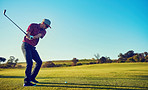 Perfecting his game one swing at a time