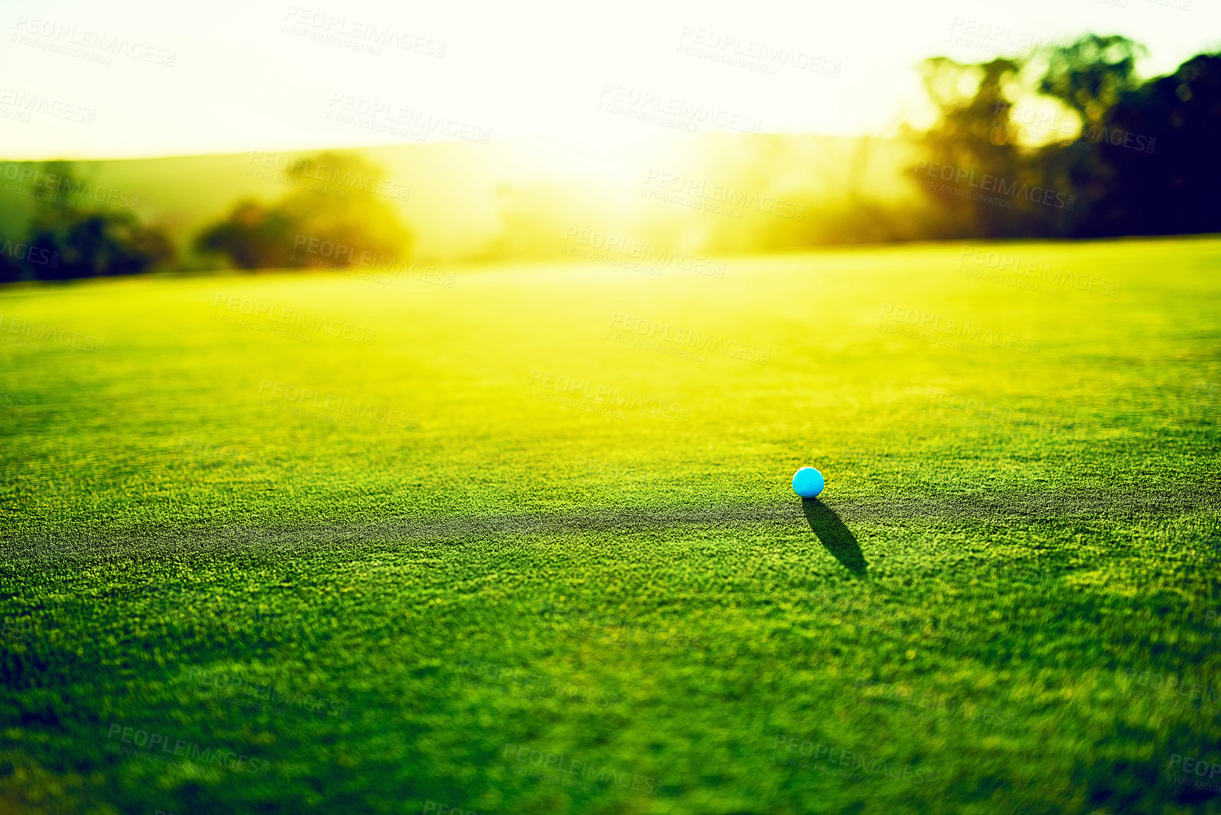 Buy stock photo Shot of a golf ball on an empty course