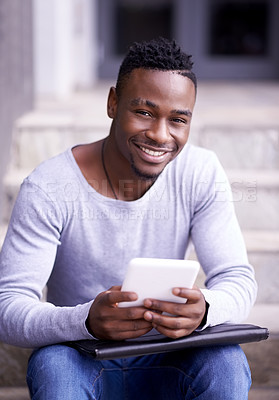 Buy stock photo Shot of a young man using wireless technology