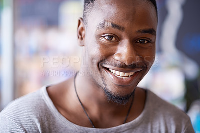 Buy stock photo Cropped shot of a young man sitting in a cafe