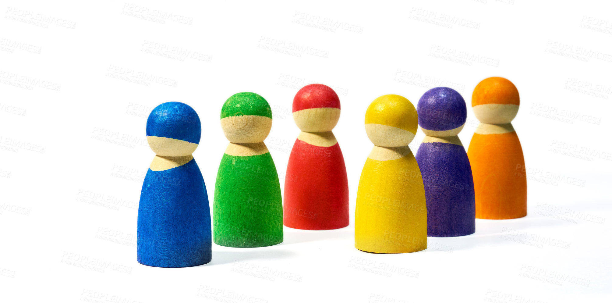 Buy stock photo Wood, figure and color on white background for community, diversity and teamwork with social group. Wooden icon, studio and friendship with connection, society or abstract people together with symbol