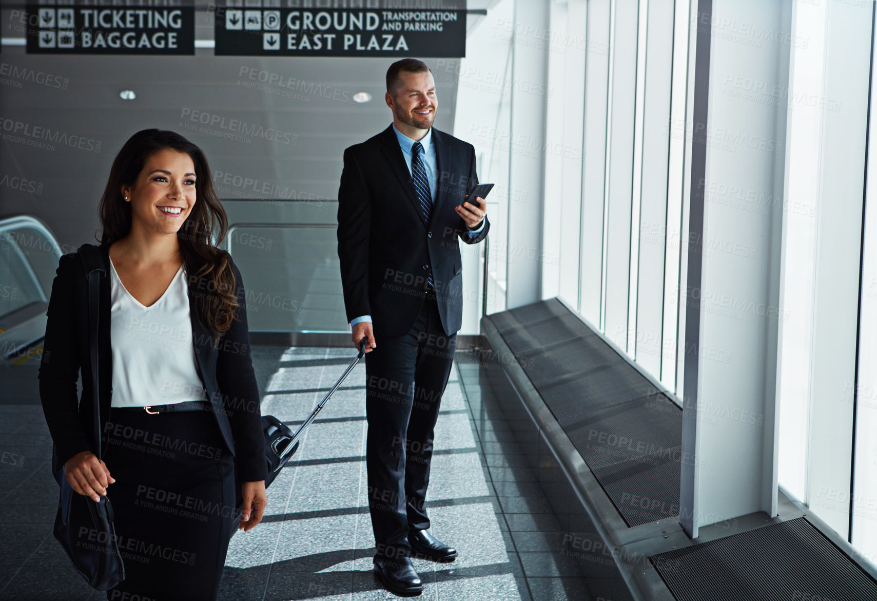 Buy stock photo Happy, thinking or business people in airport with suitcase, luggage or phone waiting to travel. Walking, employees or corporate workers texting on social media mobile app on international flight