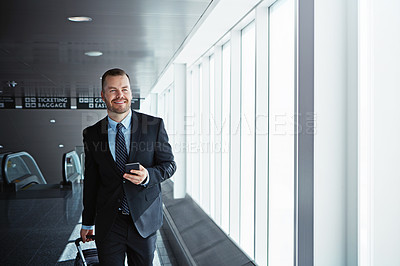 Buy stock photo Business man, phone and luggage in airport for smile, thinking or email notification on international travel. Entrepreneur, bag or smartphone for flight schedule, global immigration or idea in London