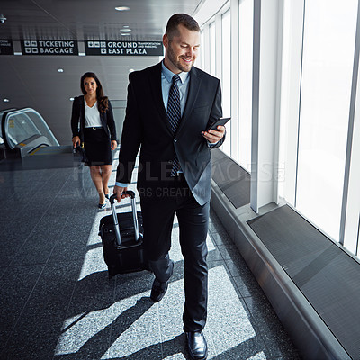 Buy stock photo Business man, smartphone and suitcase in airport hallway with smile, thinking or idea for international travel. Entrepreneur, luggage and phone with flight schedule for global immigration in London