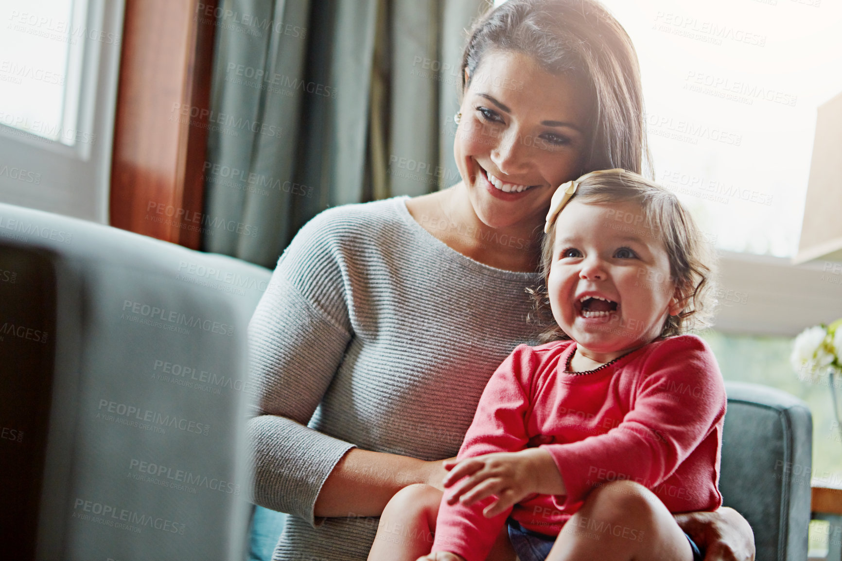 Buy stock photo Mom, toddler and happy with laughing on sofa in home living room with care, love and bonding together. Girl, mother and daughter with funny memory on couch with smile for connection in family house