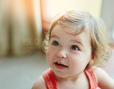 Buy stock photo Smile, girl and toddler with thinking in home for cheerful, fun and child development on weekend. Curious, baby and wonder with happiness in house for innocent childhood, joy or positivity in morning