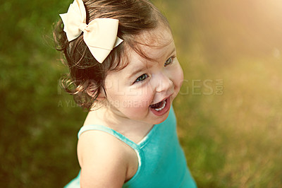 Buy stock photo High angle shot of an adorable little girl outside