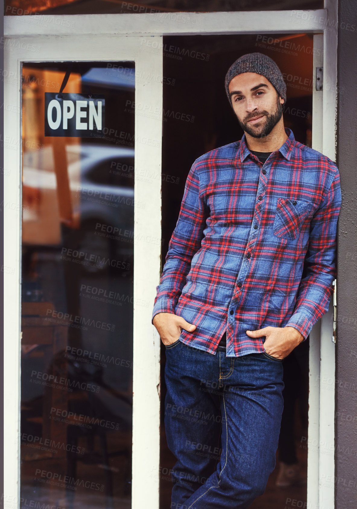 Buy stock photo Small business, restaurant and portrait of man with sign at entrance of cafe with smile. Open, confidence and entrepreneur at coffee shop with career in service, hospitality and happiness at door