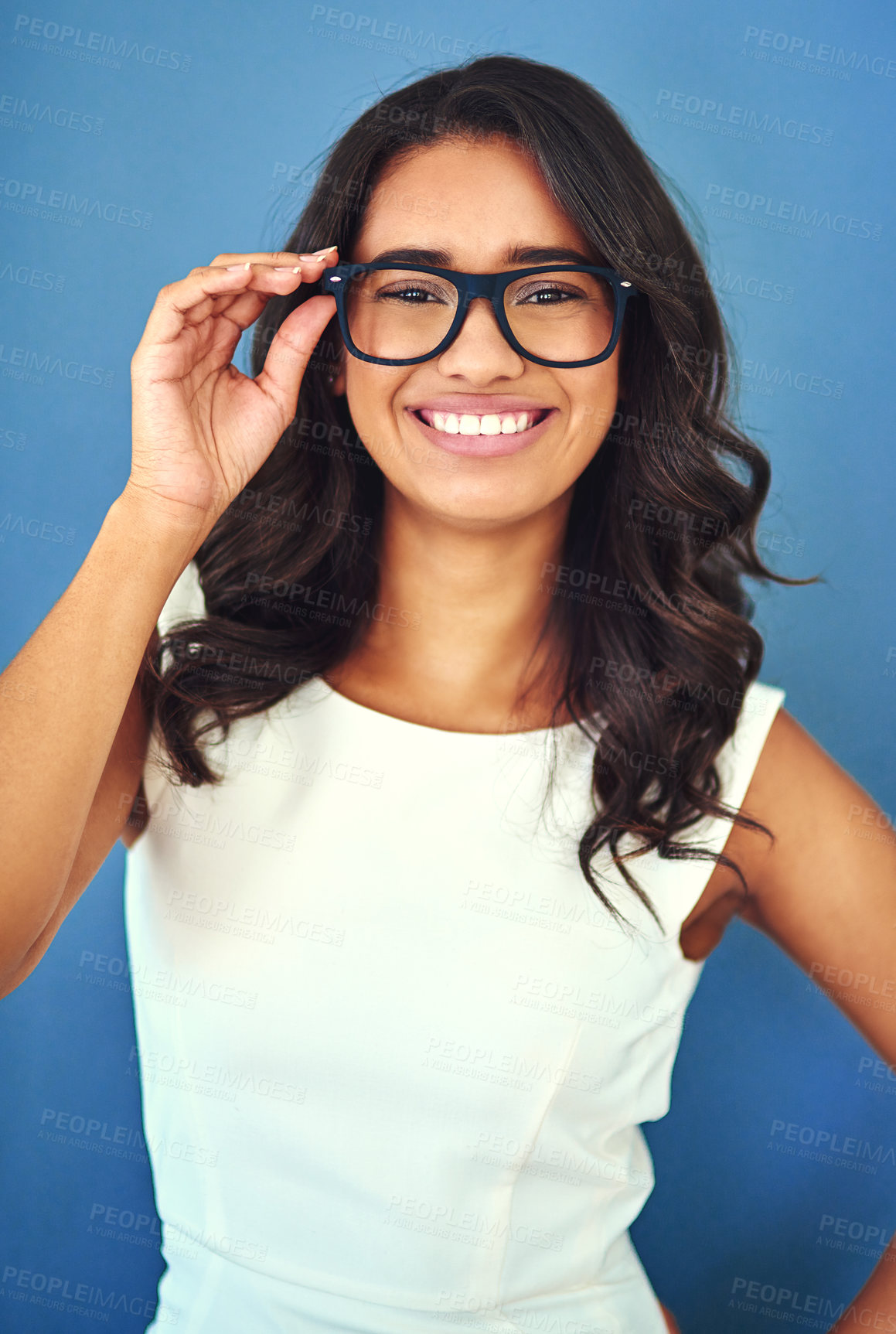 Buy stock photo Woman, portrait and studio optometry with spectacles, eye care and vision aid for sight on blue background. Business person, frame and opthalmology product, visual assistance and mock up with glasses