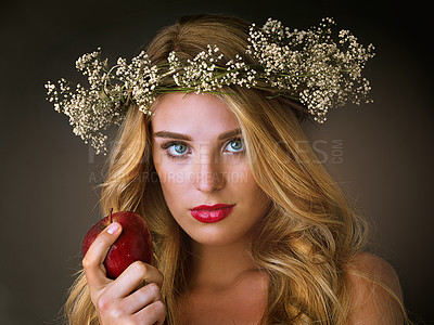 Buy stock photo Girl, portrait and beauty with apple in studio for eating or wellness, organic cosmetics and natural dermatology for alluring feel. Makeup, woman and forbidden fruit on dark background for nutrition.