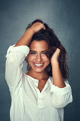 Buy stock photo Woman, smile and portrait or pose, hair and studio background for fashion, style and proud or confident. Happy female person, beauty and face for cosmetics, glow and cool or retro clothing or vintage