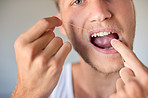 Flossing his way to healthy teeth